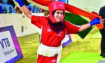 Kashmiri Girl Tajamul Islam wins World Kickboxing Gold